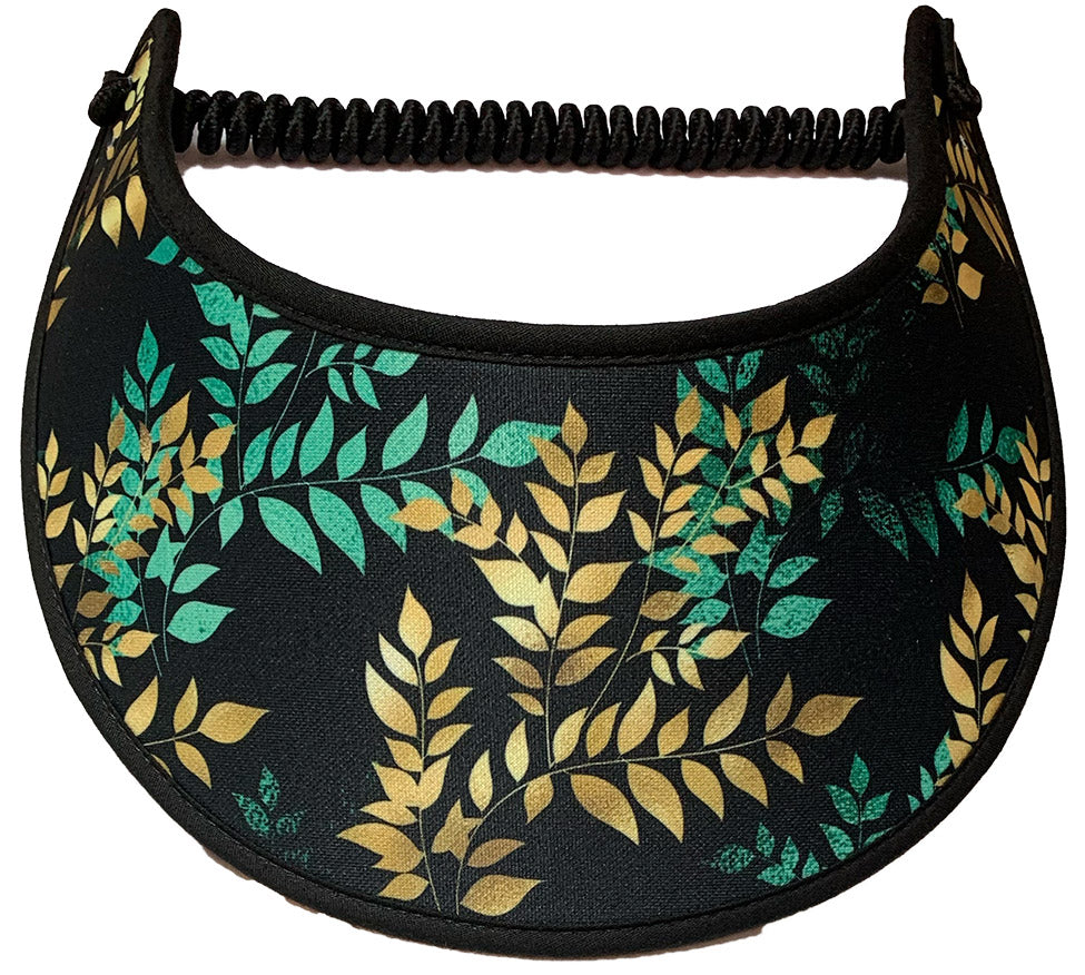 The color scheme consists of green and gold leaves against a black background.