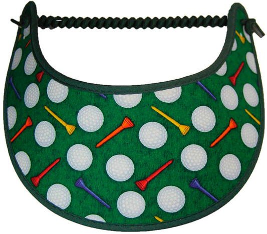 Foam sun visor with golf tees and balls on green