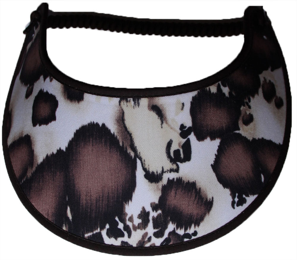Foam sun visor with brown and white cow print.