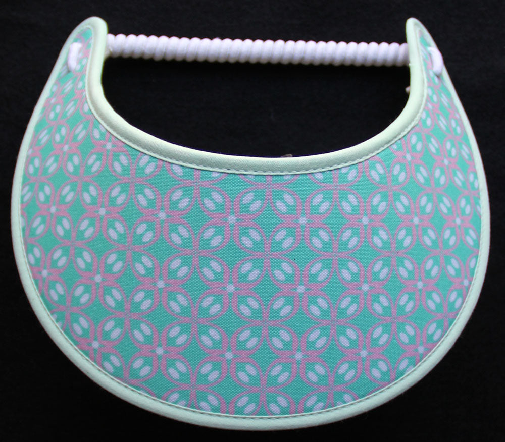 Foam sun visor with pink and white design on aquamarine
