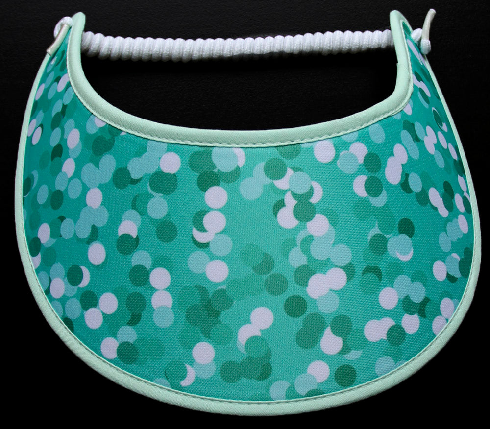 Foam sun visor wit assorted shades of green dots. Mint green trim