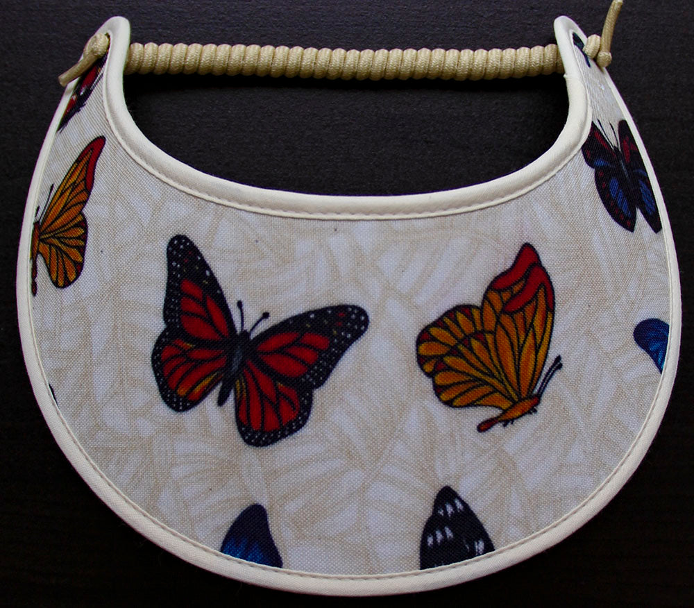 Foam sun visor with assorted butterflies on off white background