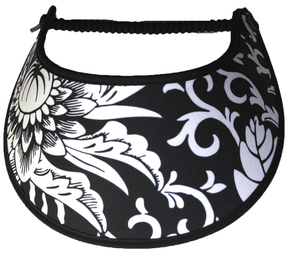 Foam sun visor with a large whit flower and leaves on black