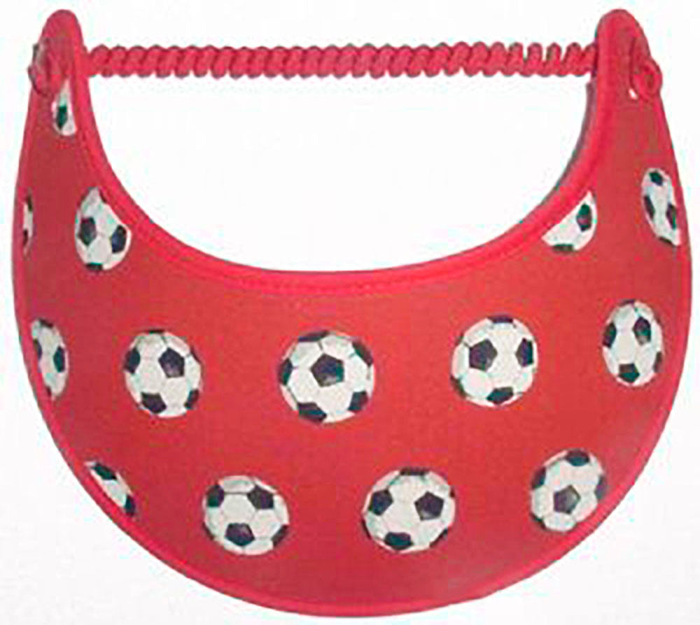 Foam sun visor with soccer balls on red background.