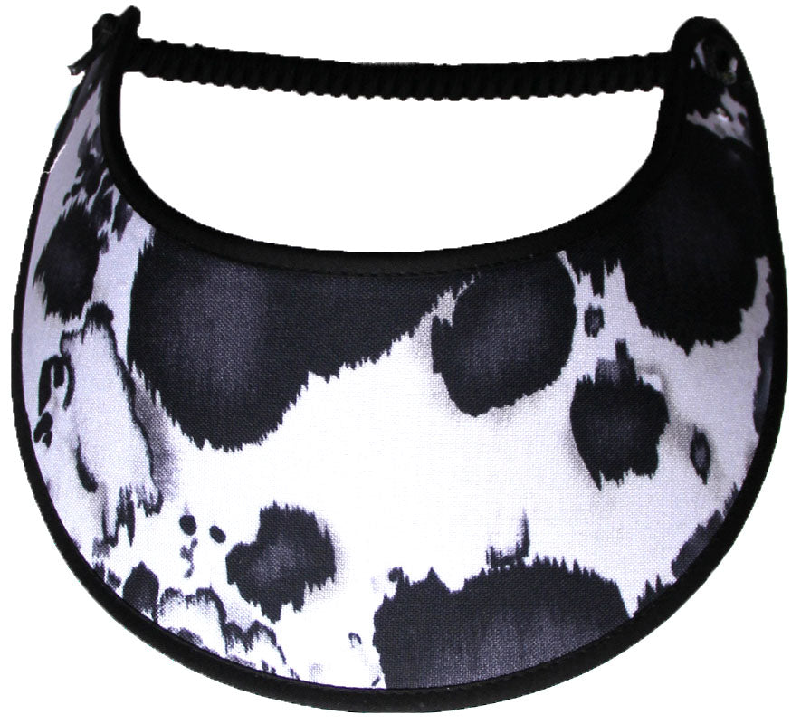 Foam sun visor with black and white cow print.